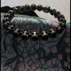 Goldtone and black stone  bracelet